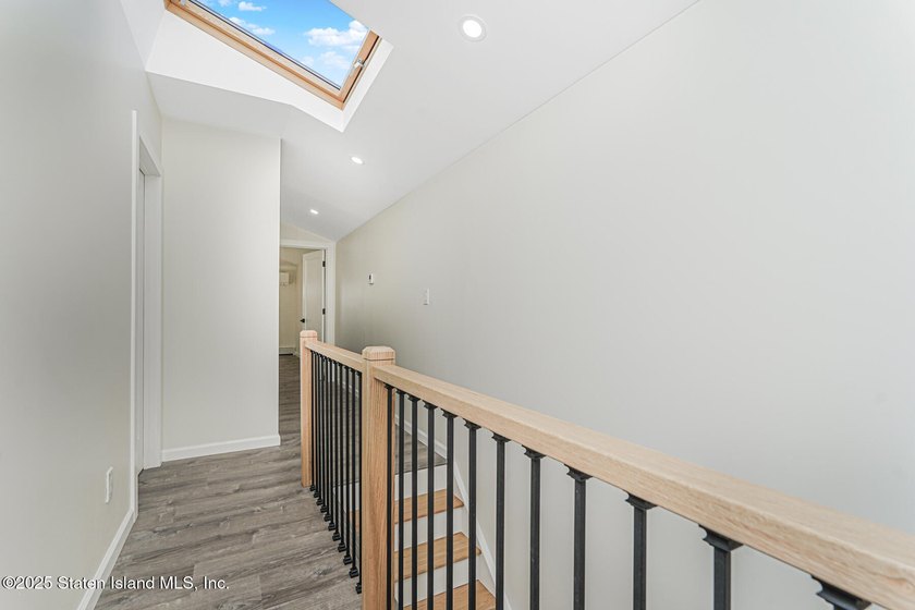'This elegant 2 Family home features a sophisticated stocco and - photo 19
