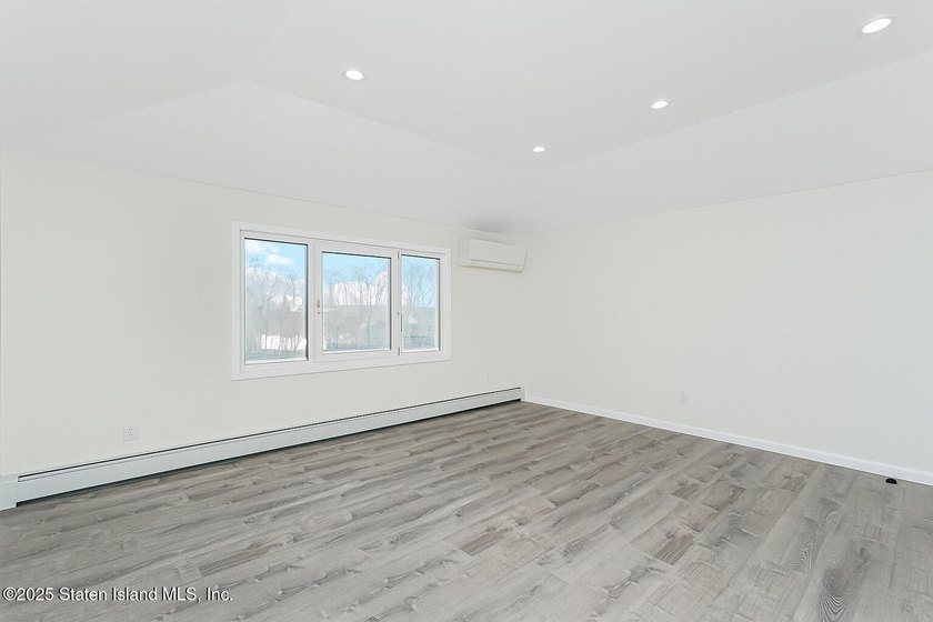 'This elegant 2 Family home features a sophisticated stocco and - photo 28
