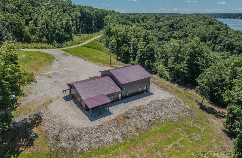 Spacious 1.20 acres and 80' of lakefront in a reg no wake cove - photo 20