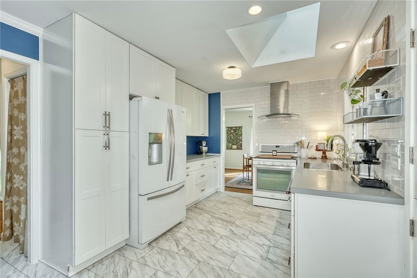 Welcome home to this beautifully updated 4-bedroom, 2-bath - photo 16