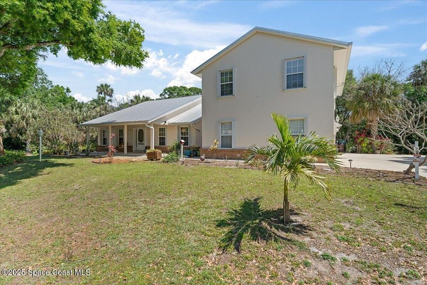 A rare custom-built retreat surrounded by the natural beauty of - photo 3