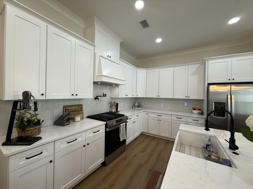 Construction complete and move-in ready! This home is less than - photo 15