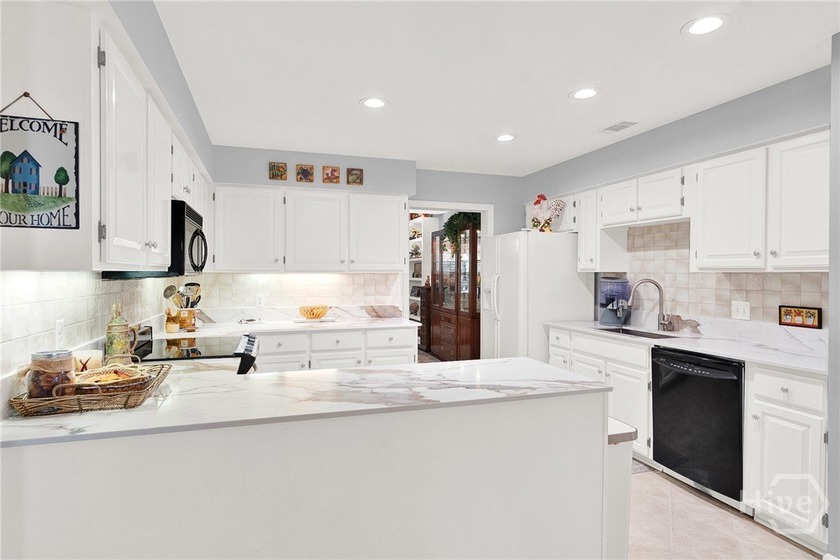 Professionally and tastefully renovated, this light-filled &amp; - photo 15