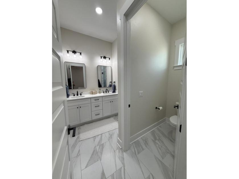 Construction complete and move-in ready! This home is less than - photo 25