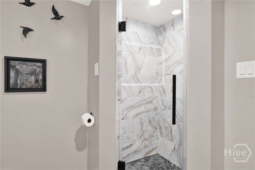Professionally and tastefully renovated, this light-filled &amp; - photo 25