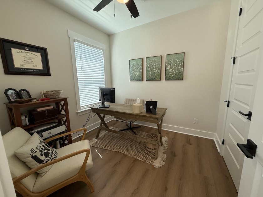 Construction complete and move-in ready! This home is less than - photo 34
