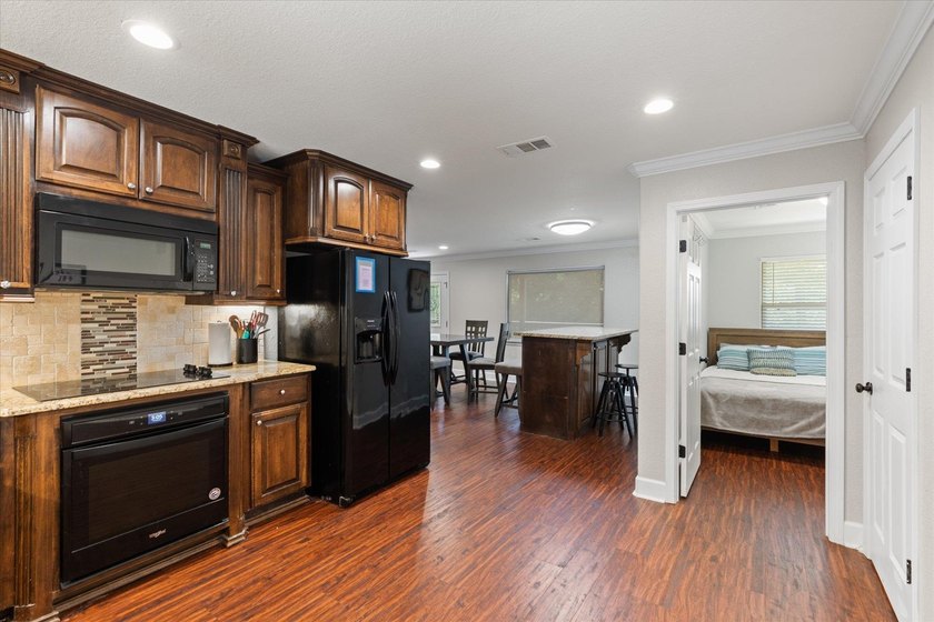 Just a few steps from Lake O' the Pines, this fully furnished - photo 2