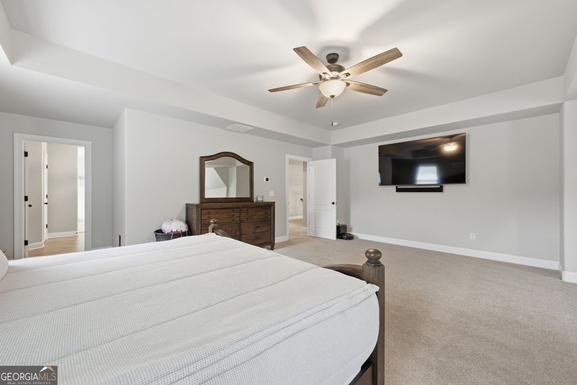 Welcome to 122 Brooks Landing, an exceptional 5-bedroom, 5 - photo 36