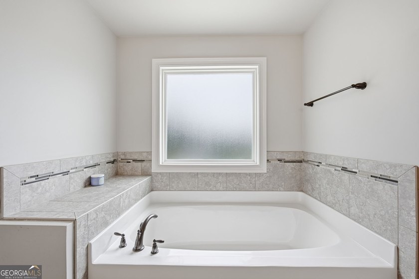 Welcome to 122 Brooks Landing, an exceptional 5-bedroom, 5 - photo 45