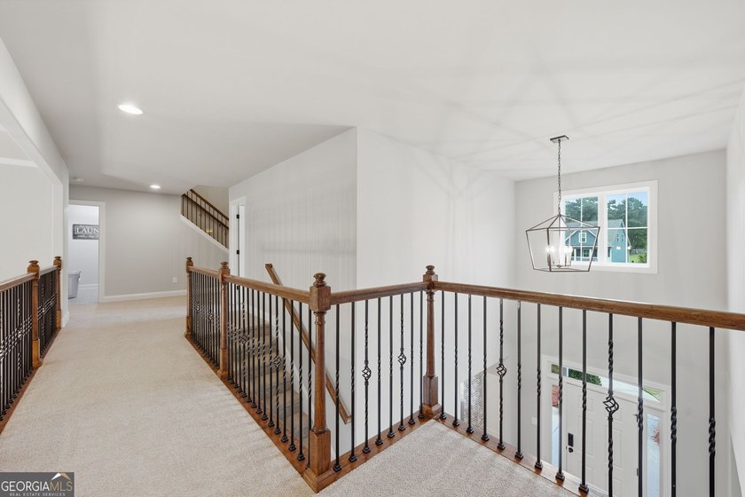 Welcome to 122 Brooks Landing, an exceptional 5-bedroom, 5 - photo 46