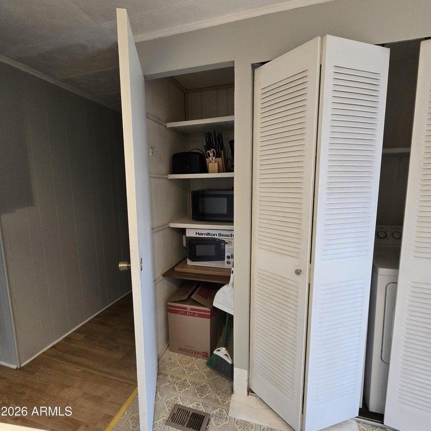 ON LEASED LAND: Step inside to an open large front room opens to - photo 25
