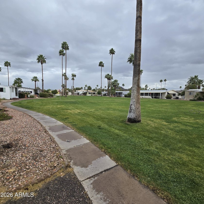 ON LEASED LAND: Step inside to an open large front room opens to - photo 40