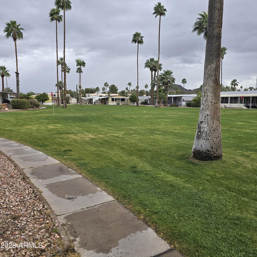 ON LEASED LAND: Step inside to an open large front room opens to - photo 41