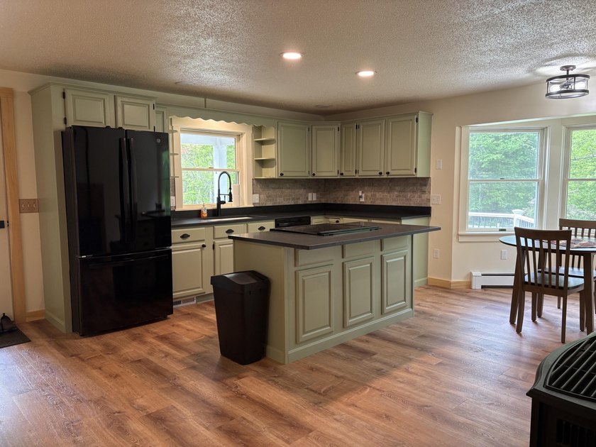 Nestled on 10 private acres, this beautifully updated home - photo 4