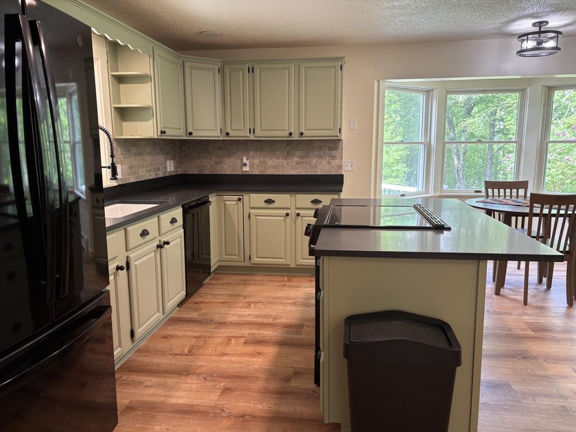 Nestled on 10 private acres, this beautifully updated home - photo 6