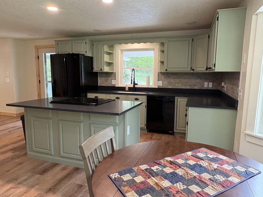 Nestled on 10 private acres, this beautifully updated home - photo 9