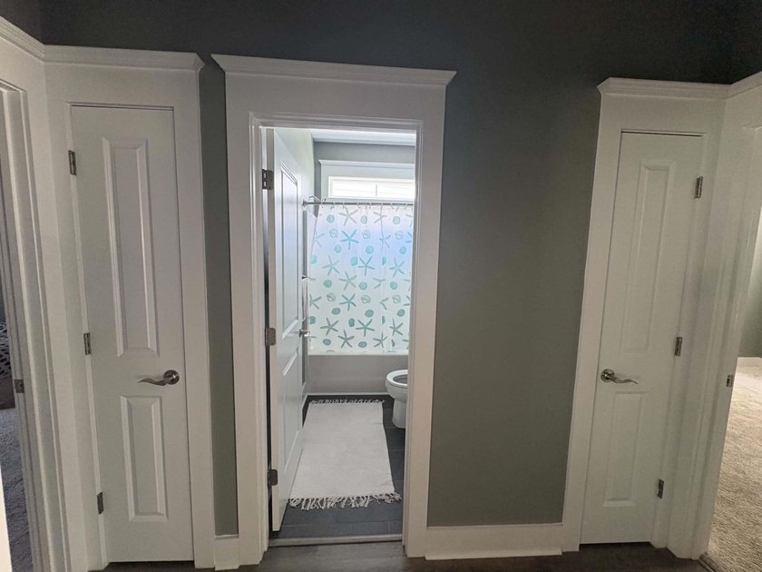 Beautiful open floorplan house with view of pond in backyard - photo 44