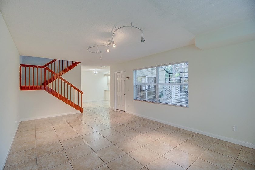 Tranquil 2-story townhouse featuring a bright, open floor plan - photo 5