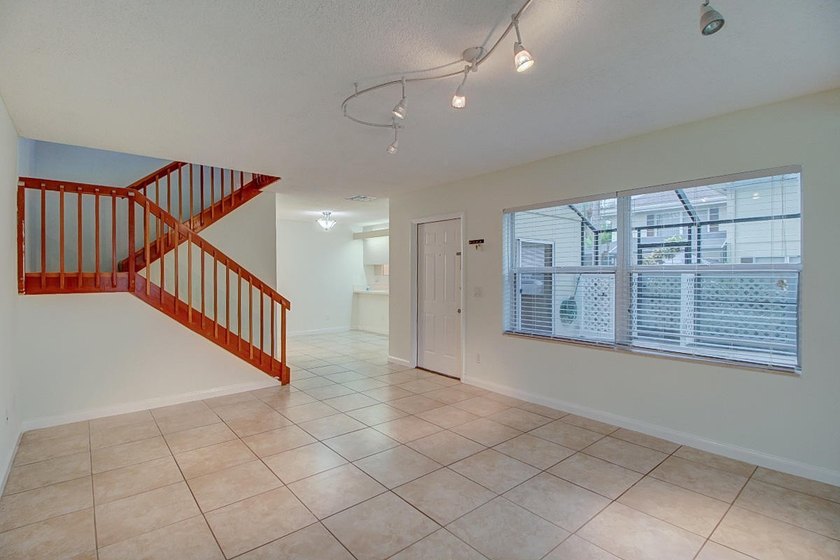 Tranquil 2-story townhouse featuring a bright, open floor plan - photo 7