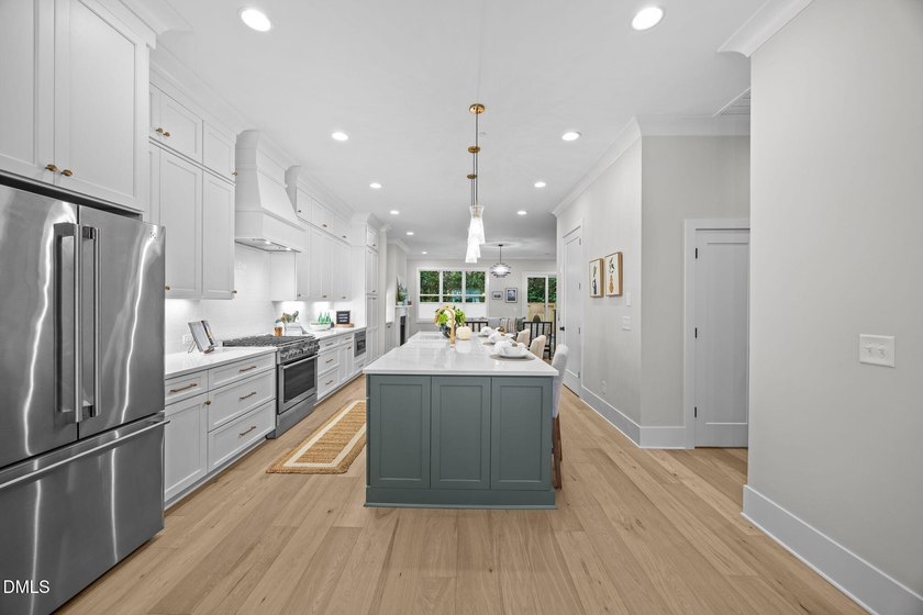 2025 Parade of Homes entry. Artfully crafted to blend the - photo 3