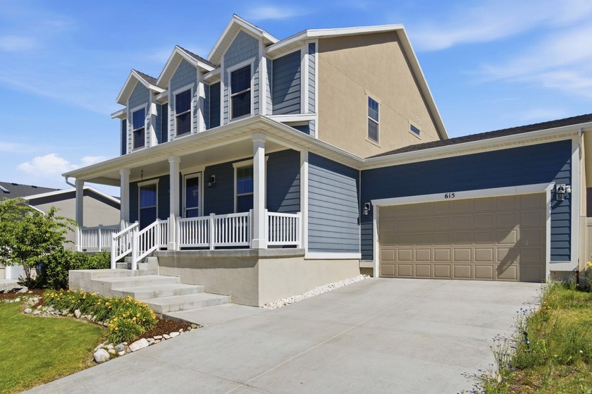2 STORY UPGRADED IVORY BUILT GEM- Dreamy Great room/kitchen - photo 2