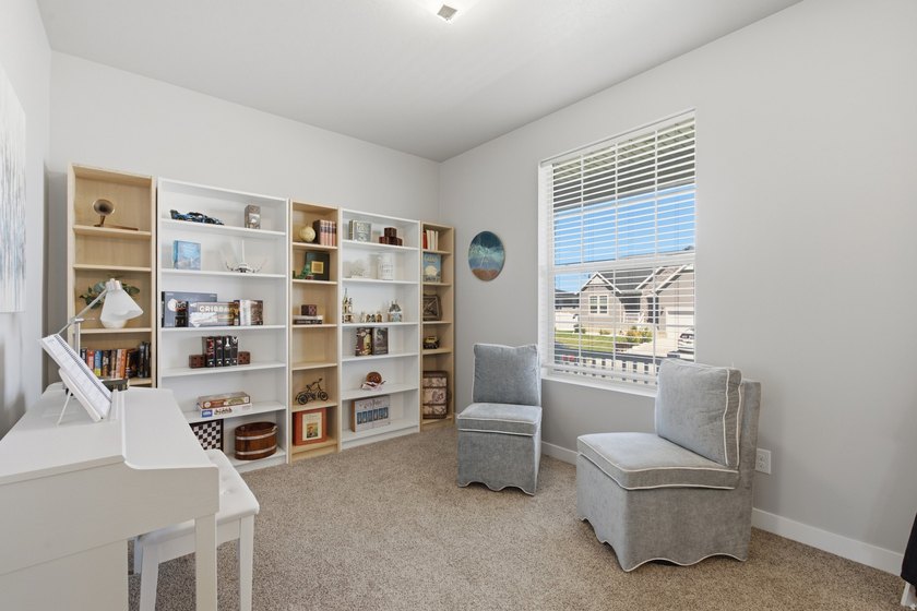 2 STORY UPGRADED IVORY BUILT GEM- Dreamy Great room/kitchen - photo 10