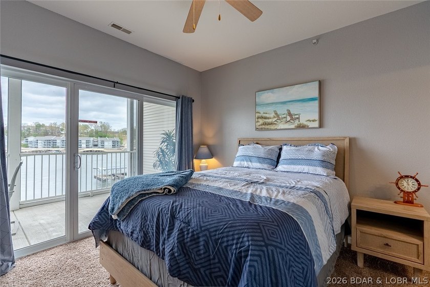 Wake up to the lake every single morning! This stunning - photo 34