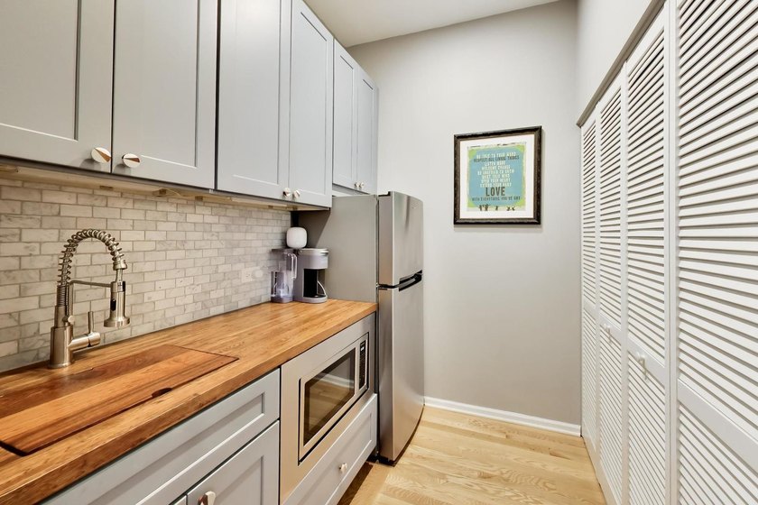 RARE PROPERTY ALERT: COVETED PENTHOUSE DUPLEX LOFT WITH PRIVATE - photo 20