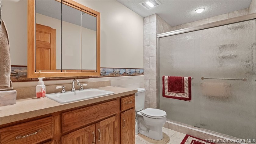 Privacy, acreage, and lakefront living come together at this - photo 33