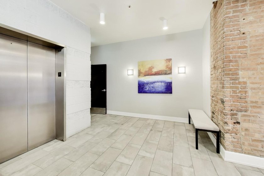 RARE PROPERTY ALERT: COVETED PENTHOUSE DUPLEX LOFT WITH PRIVATE - photo 47