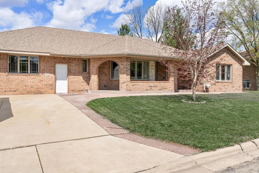 Spacious and versatile, this brick rambler offers nearly 4,000 - photo 2