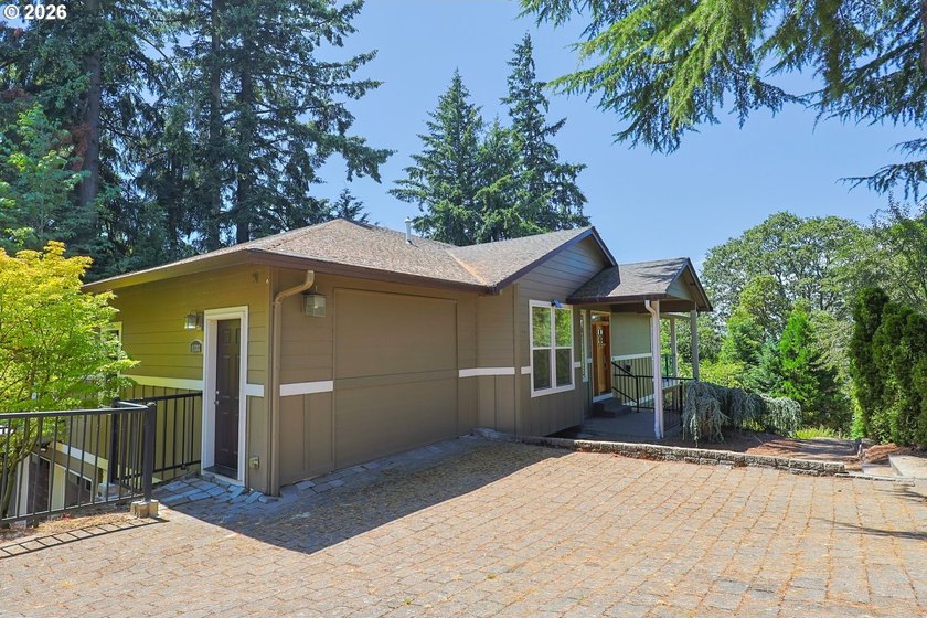 Thoughtfully designed with spacious rooms and an open, vaulted - photo 3