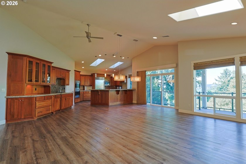Thoughtfully designed with spacious rooms and an open, vaulted - photo 9
