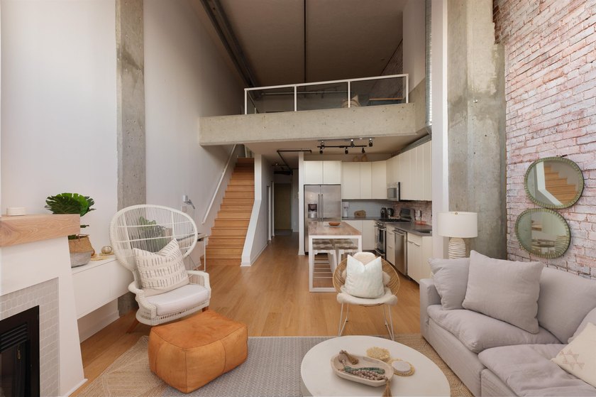 This two-level, 1 bedroom (potential for 2) Gastown loft sits on - photo 12