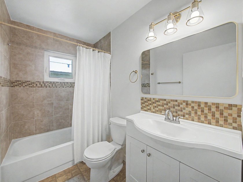 Nestled in the heart of the highly sought-after Village of - photo 22