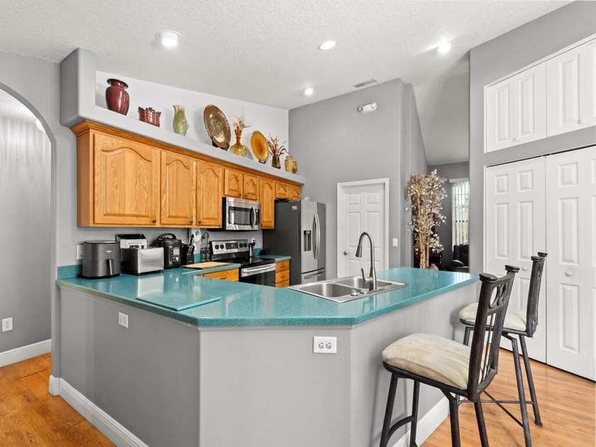 This spacious 4-bedroom, 3-bath home has been thoughtfully - photo 7