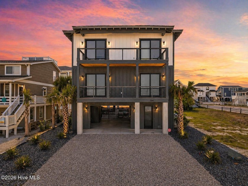Welcome to 164 E Second Street in Ocean Isle Beach, a stunning - photo 3