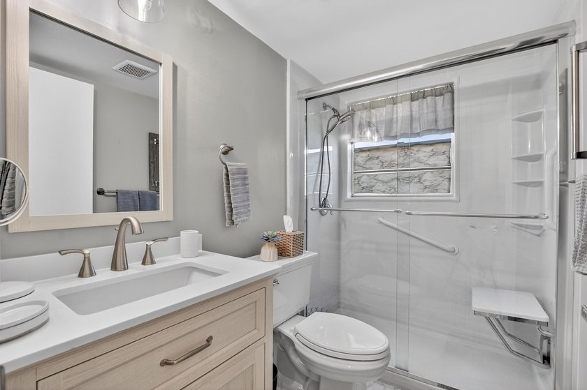 Beautifully RENOVATED 2nd floor CORNER condo in Century Village - photo 14