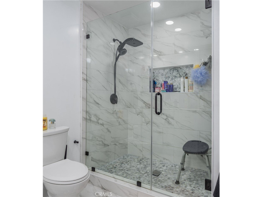 Welcome to this beautifully renovated first-level condominium in - photo 18