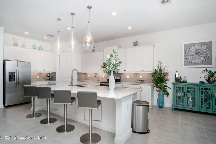 This stunning 4-bedroom, 3-bath home with a 3-car garage, is - photo 9