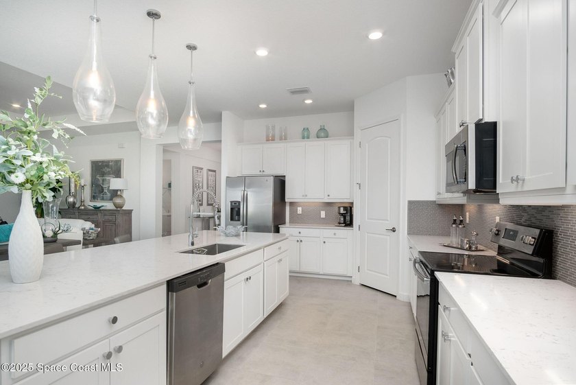 This stunning 4-bedroom, 3-bath home with a 3-car garage, is - photo 10