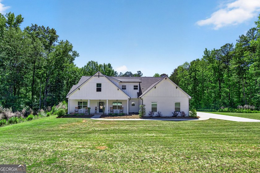 Just four years old and nestled on over 4 private acres, this - photo 6