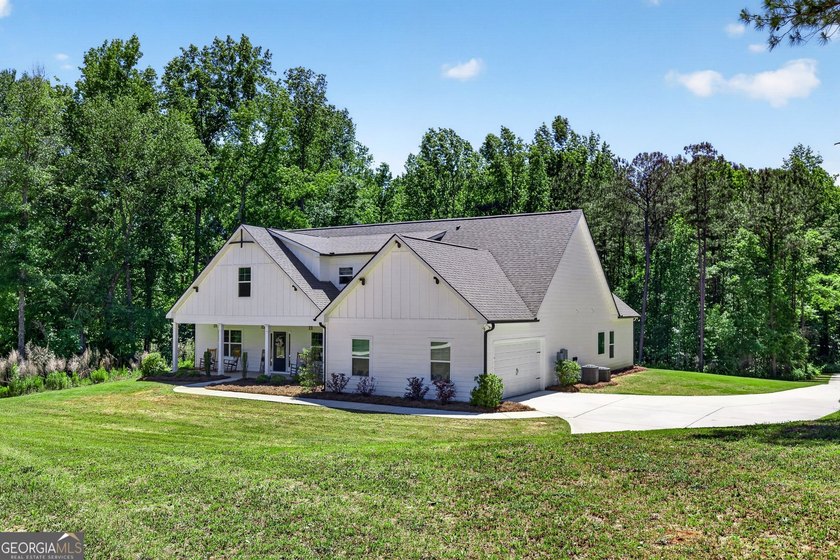 Just four years old and nestled on over 4 private acres, this - photo 8