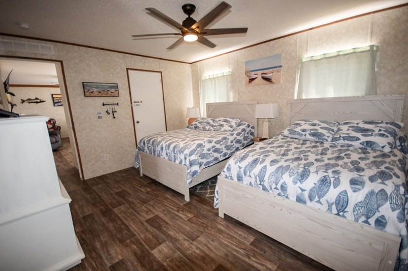 *NO FLOOD ZONE * Welcome to this turnkey coastal retreat nestled - photo 14