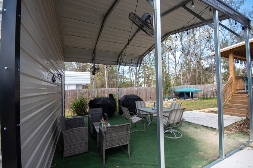 *NO FLOOD ZONE * Welcome to this turnkey coastal retreat nestled - photo 23