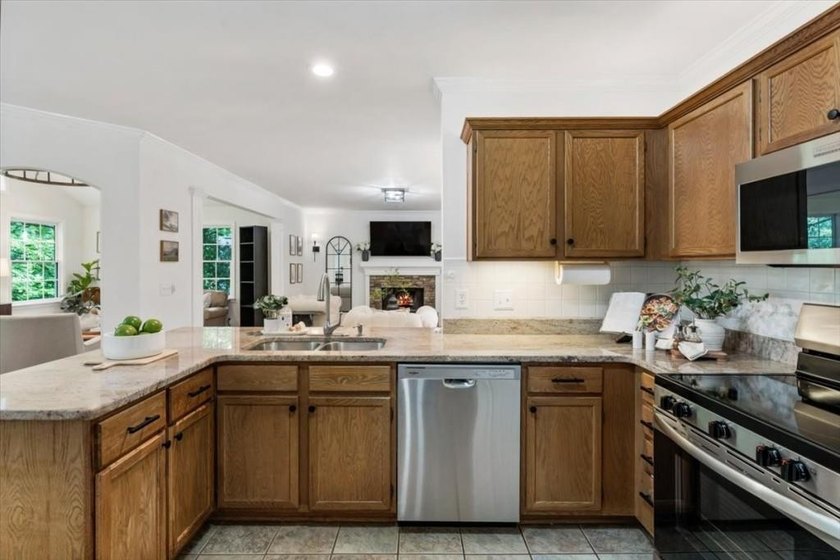 This welcoming home in the heart of the sought-after swim/tennis - photo 20