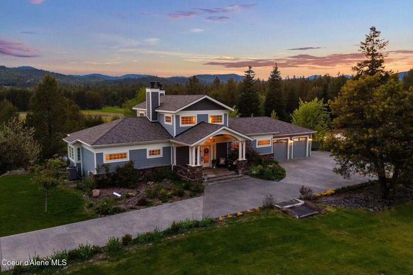 Experience refined North Idaho living in this elegant French - photo 3