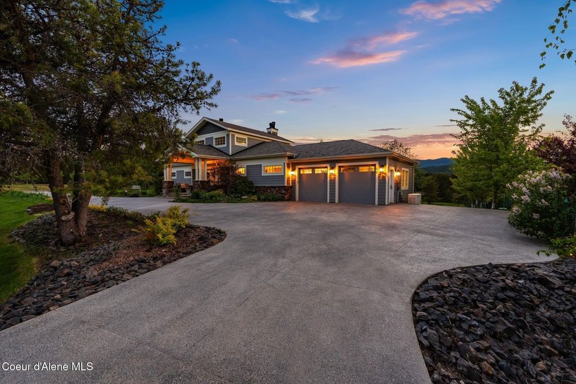 Experience refined North Idaho living in this elegant French - photo 4