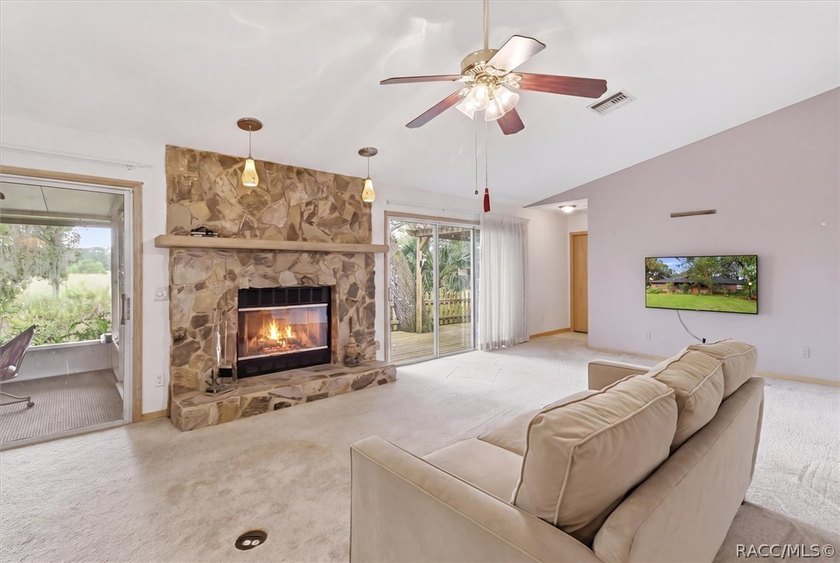 Nestled beneath a canopy of majestic oak trees and overlooking - photo 11