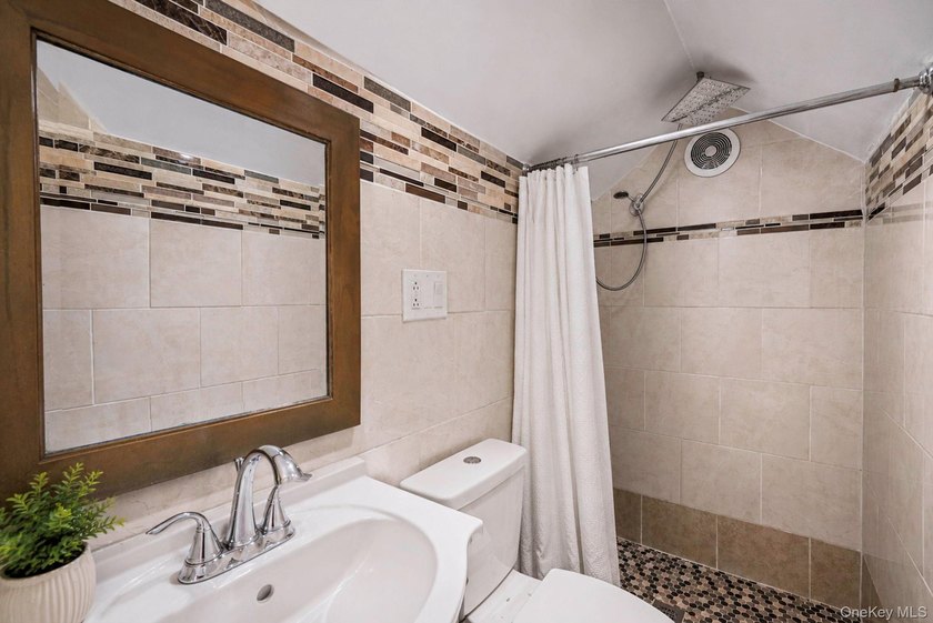 Welcome to this charming 4-bedroom, 2-bath Cape Cod situated on - photo 16